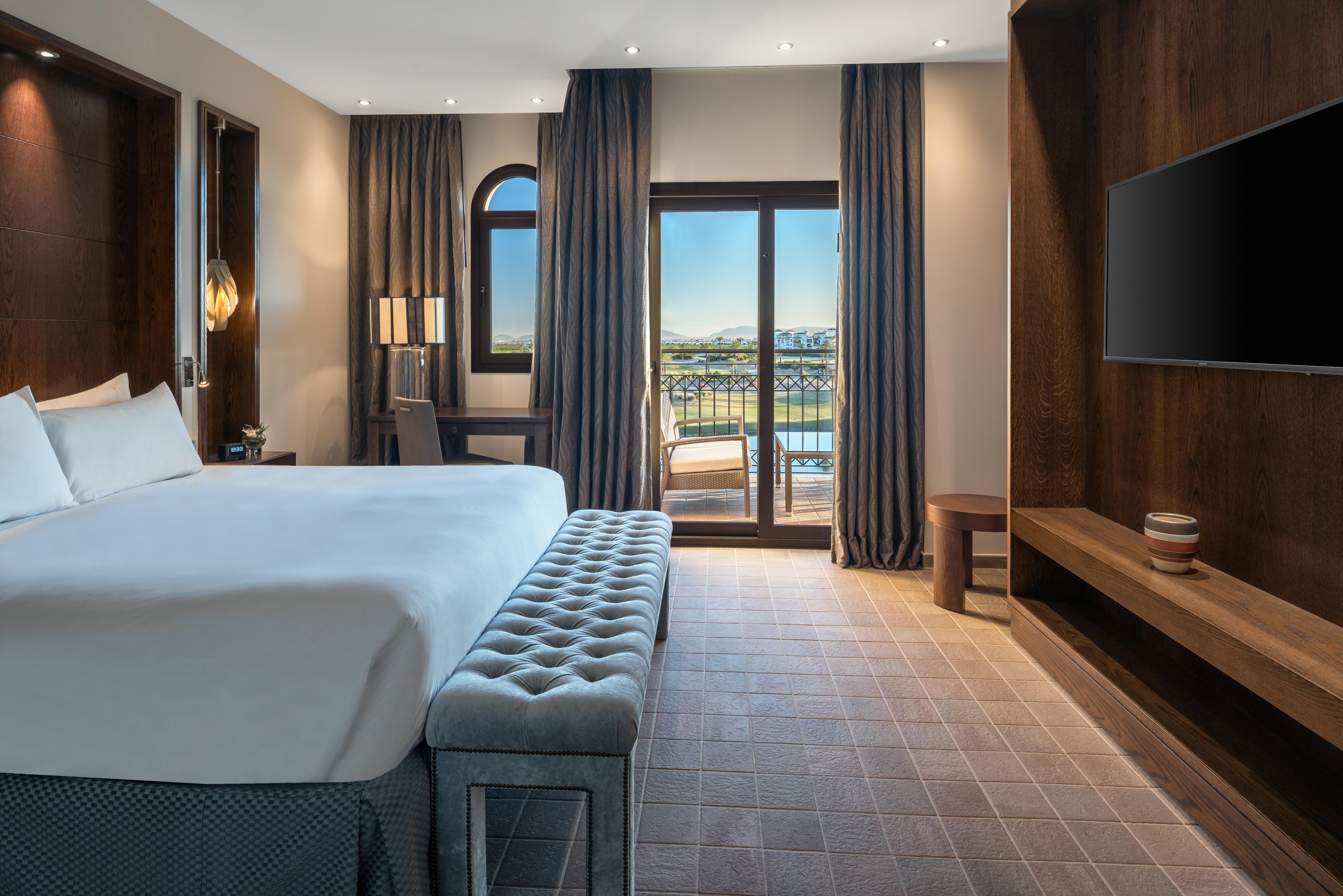 Doubletree By Hilton La Torre Golf Resort Roldán Kültér fotó A guest room at the hotel