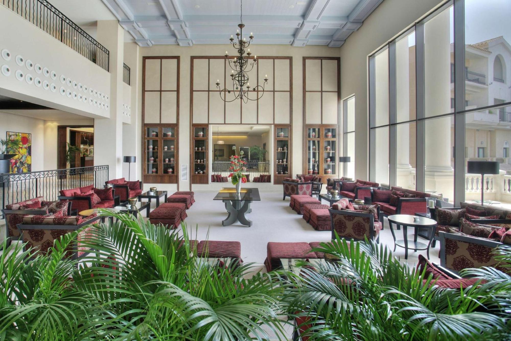 Doubletree By Hilton La Torre Golf Resort Roldán Kültér fotó The lobby of the hotel
